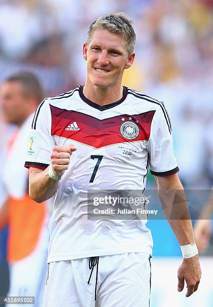 Bastian Schweinsteiger of Germany celebrates after a 1-0 victory over France 1-0 in the 2014 FIFA World Cup Brazil Quarter Final match between France...