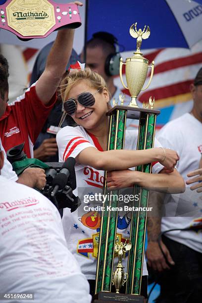 Miki Sudo wins the women's division of the Nathan's Famous Hot Dog Eating Contest at Coney Island on July 4, 2014 in the Brooklyn borough of New York...