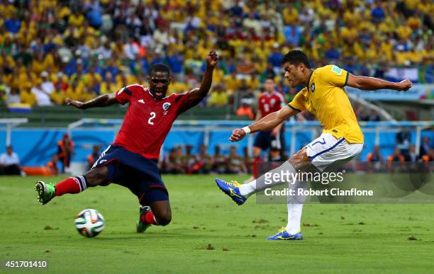 Hulk of Brazil and Cristian Zapata of Colombia compete for the ball during the 2014 FIFA World Cup Brazil Quarter Final match between Brazil and...