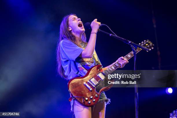 Alana Haim from Haim performs at the Roskilde Festival 2014 on July 4, 2014 in Roskilde, Denmark.