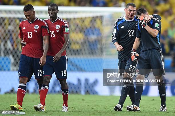 Colombia's midfielder Fredy Guarin , Colombia's forward Adrian Ramos, Colombia's goalkeeper Faryd Mondragon and Colombia's goalkeeper David Ospina...