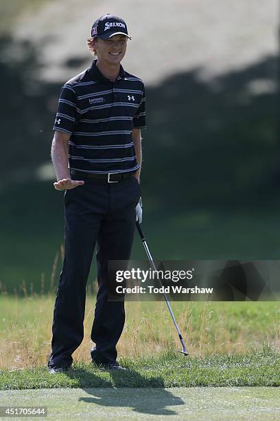 Will Wilcox reacts to a shot on the second fairway during the second round of the Greenbrier Classic at the Old White TPC on July 4, 2014 in White...