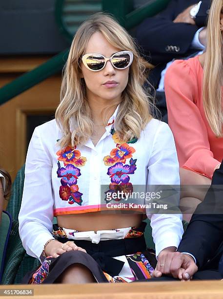 Suki Waterhouse attends the semi-final match between Novak Djokovic and Grigor Dimitrov on centre court at The Wimbledon Championships at Wimbledon...