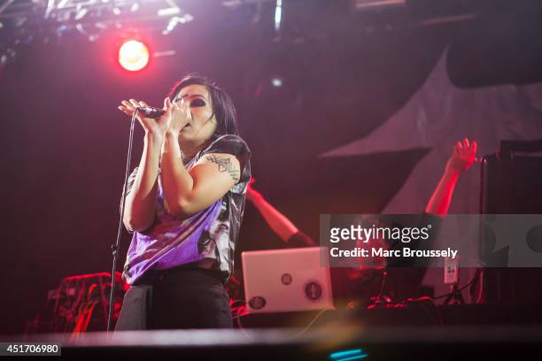 Nic Endo and Alec Empire of Atari Teenage Riot perform on stage at Sonisphere at Knebworth Park on July 4, 2014 in Knebworth, United Kingdom.