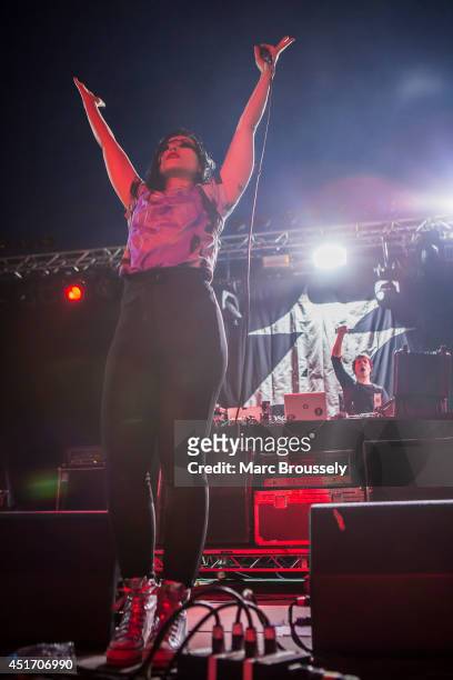 Nic Endo and Alec Empire of Atari Teenage Riot perform on stage at Sonisphere at Knebworth Park on July 4, 2014 in Knebworth, United Kingdom.