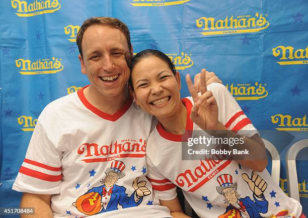 Joey Chestnut and Sonya Thomas at the 2014 Nathan's Famous 4th July International Hot Dog Eating Contest at Coney Island on July 4, 2014 in the...