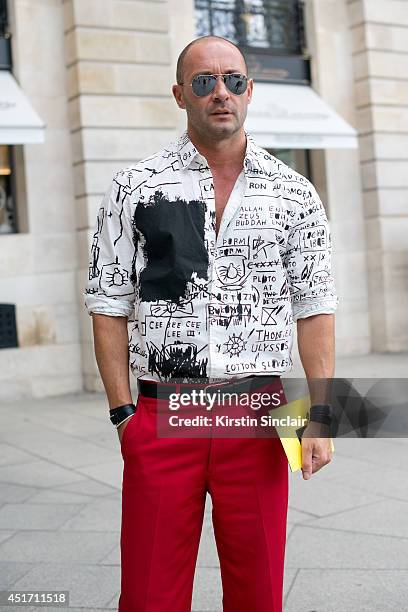 Fashion Journalist and designer Vuc Mirovic wearing Prada trousers, Supreme shirt, Ray ban sunglasses on day 3 of Paris Collections: Men on JUNE 27,...