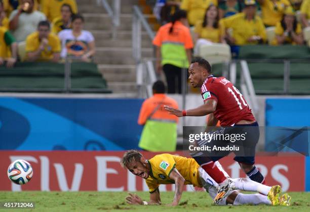 Brazil's Neymar challenges Colombia's Zuniga during the 2014 FIFA World Cup Brazil Quarter Final match between Brazil and Colombia at Castelao on...