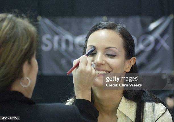 Claudia Mason and Smashbox Cosmetics team during Smashbox LA Fashion Week Spring 2004 - Susan Holmes Backstage in Culver City, California, United...