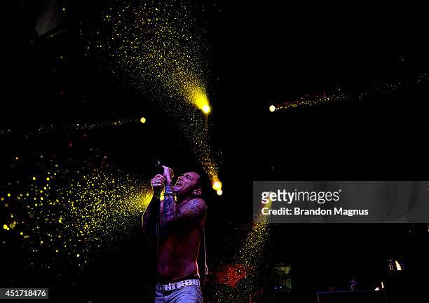 Frontman A. Jay Popoff of Lit performs in the rain during UFC International Fight Week Free Concert Featuring Lit, P.O.D., and Papa Roach at the...