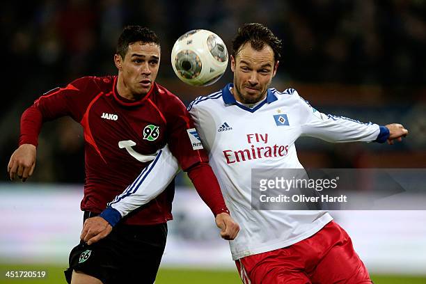 Heiko Westermann of Hamburg and Maunel Schmiedebach of Hannover compete for the ball during the Bundesliga match between Hamburger SV and Hannover 96...