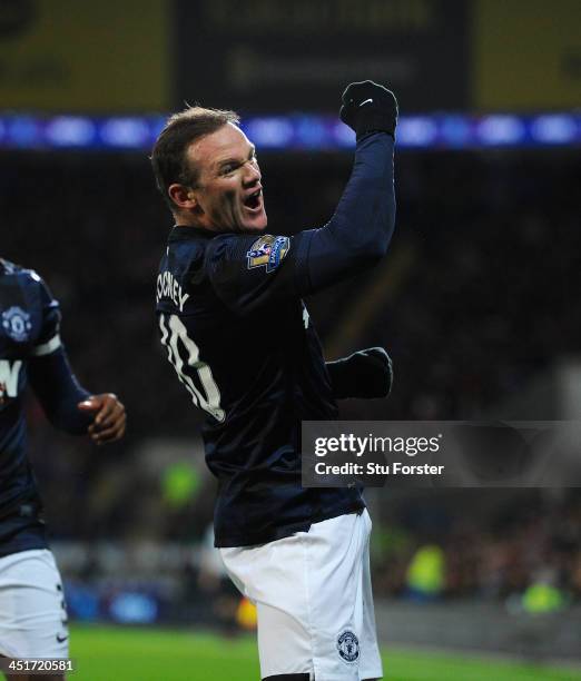 Manchester United player Wayne Rooney celebrates the first goal during the Barclays Premier League match between Cardiff City and Manchester United...