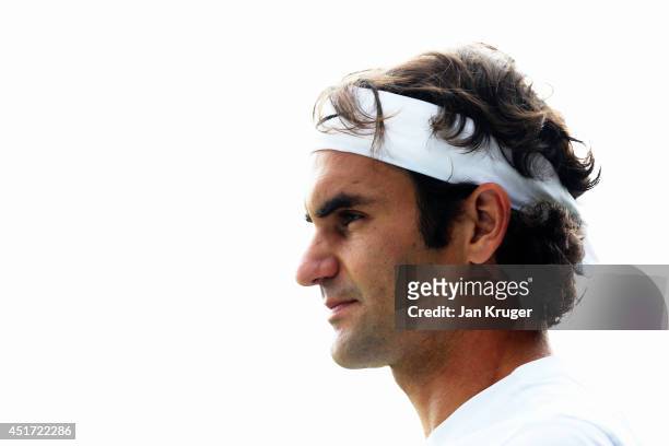 Roger Federer of Switzerland during a practice session on day twelve of the Wimbledon Lawn Tennis Championships at the All England Lawn Tennis and...