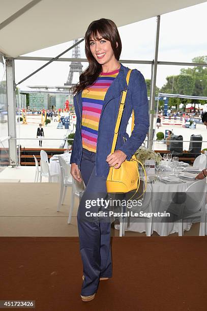 Nolwenn Leroy attends the Paris Eiffel Jumping presented by Gucci at Champ-de-Mars on July 5, 2014 in Paris, France.