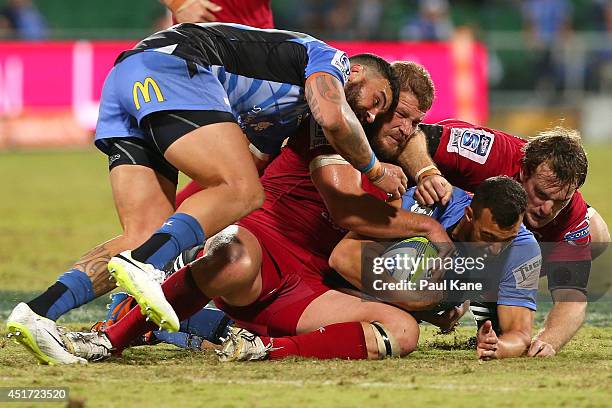 Dillyn Leyds of the Force gets tackled during the round 18 Super Rugby match between the Western Force and the Queensland Reds at nib Stadium on July...