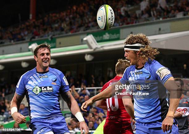 Nick Cummins of the Force celebrates after scoring a try during the round 18 Super Rugby match between the Western Force and the Queensland Reds at...