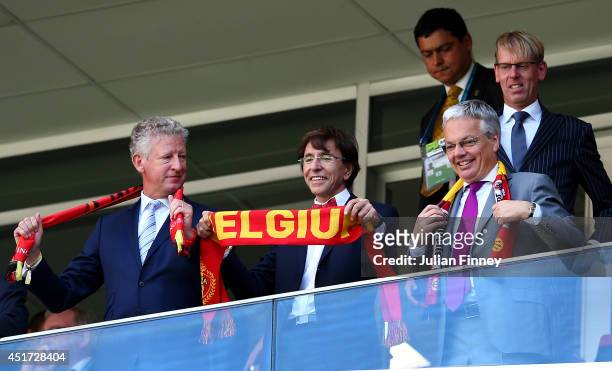 Belgian Defence Minister Pieter De Crem, Belgian Prime Minister Elio Di Rupo and Belgian Foreign Minister Didier Reynders attend the 2014 FIFA World...