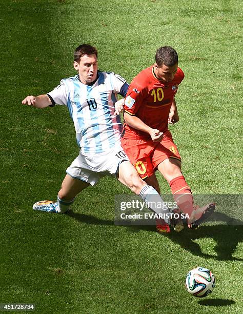 Argentina's forward Lionel Messi vies with Belgium's forward Eden Hazard during a quarter-final football match between Argentina and Belgium at the...