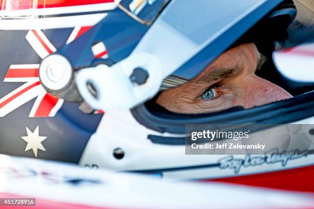 Will Power of Australia driver of the Verizon Team Penske Chevrolet sits in his car during practice for the Pocono INDYCAR 500 at Pocono Raceway on...