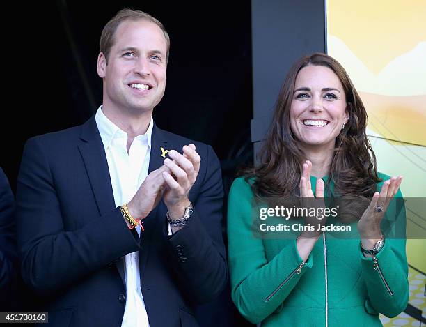Prince William, Duke of Cambridge and Catherine, Duchess of Cambridge laugh on the podium at the finish line of Stage 1 of the Tour De France on July...