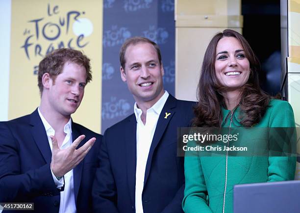 Catherine, Duchess of Cambridge, Prince William, Duke of Cambridge and Prince Harry laugh on the podium at the finish line of Stage 1 of the Tour De...