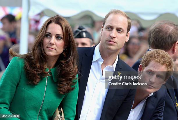 Catherine, Duchess of Cambridge, Prince William, Duke of Cambridge and Prince Harry watch riders at the finish line of Stage 1 of the Tour De France...