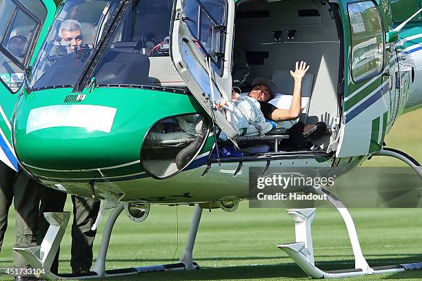 In this handout, Brazil's Neymar is seen inside a medical helicopter at the Granja Comary training center, on July 05, 2014 in Teresopolis, Brazil....