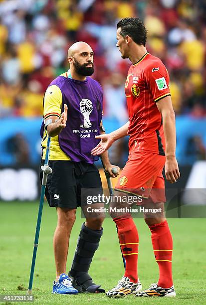 Anthony Vanden Borre and Daniel Van Buyten of Belgium react after being defeated by Argentina 1-0 during the 2014 FIFA World Cup Brazil Quarter Final...