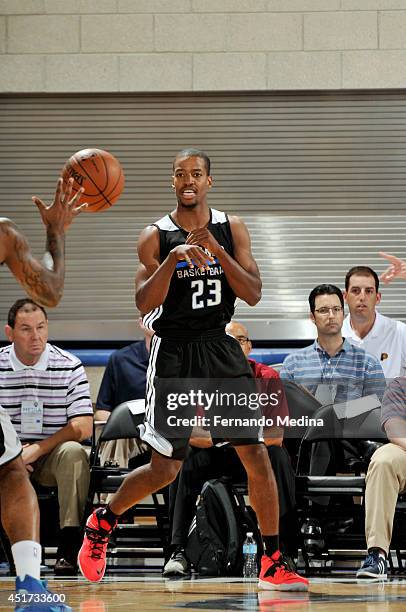 Kim English of the Orlando Magic passes the ball against the Philadelphia 76ers on July 5, 2014 at Amway Center in Orlando, Florida. NOTE TO USER:...