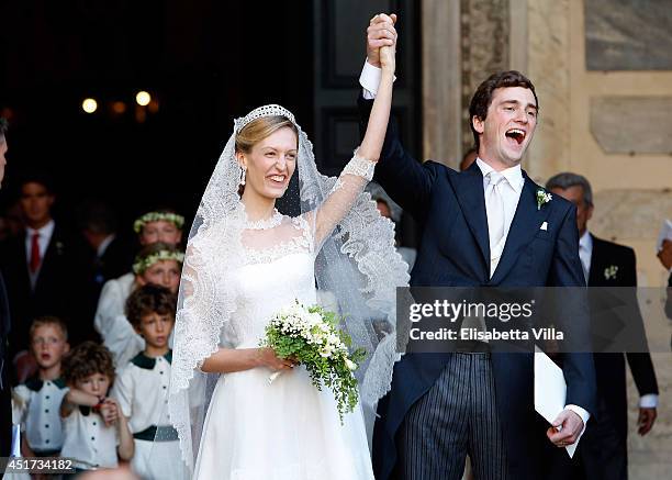 Prince Amedeo of Belgium and Princess Elisabetta Maria celebrate after their wedding ceremony at Basilica Santa Maria in Trastevere on July 5, 2014...