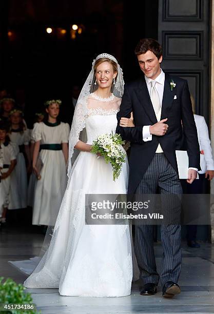 Prince Amedeo of Belgium and Princess Elisabetta Maria celebrate after their wedding ceremony at Basilica Santa Maria in Trastevere on July 5, 2014...
