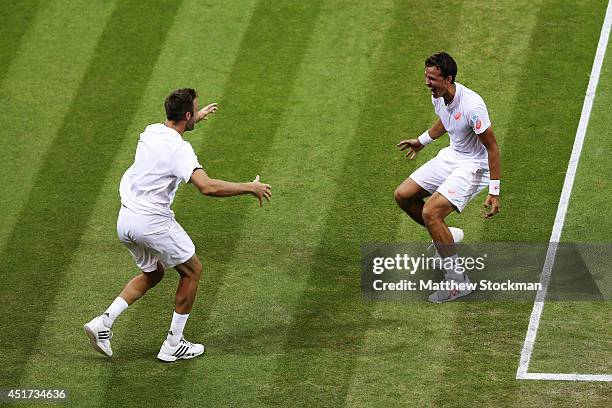 Jack Sock of the United States and Vasek Pospisil of Canada celebrates after winning the Gentlemen's Doubles Final against Bob Bryan and Mike Bryan...