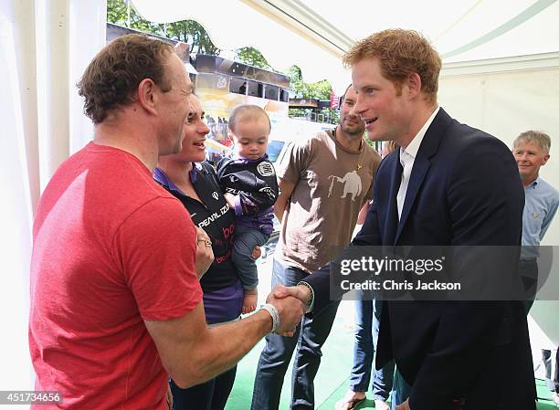 Prince Harry chats to Sarah Storey, her husband Barney and daughter Louise at the finish line of Stage 1 of the Tour De France on July 5, 2014 in...