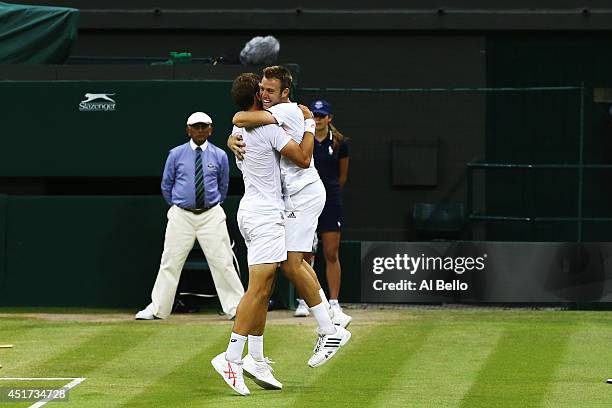 Vasek Pospisil of Canada and Jack Sock of the United States celebrate after winning the Gentlemen's Doubles Final against Bob Bryan and Mike Bryan of...