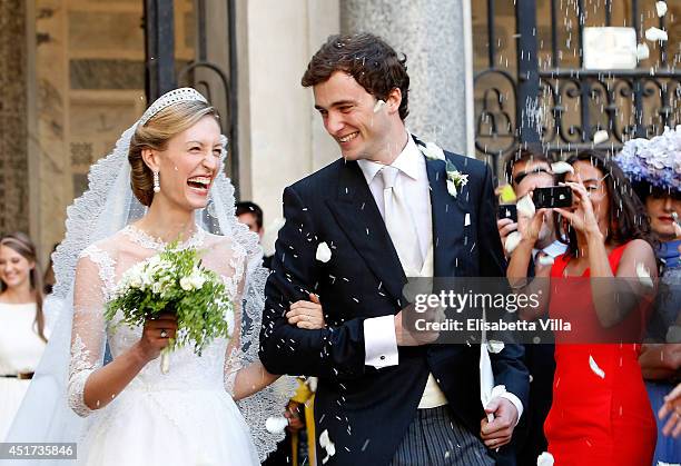 Prince Amedeo of Belgium and Princess Elisabetta Maria Rosboch von Wolkenstein celebrate after their wedding ceremony at Basilica Santa Maria in...