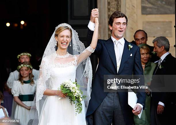 Prince Amedeo of Belgium and Princess Elisabetta Maria celebrate after their wedding ceremony at Basilica Santa Maria in Trastevere on July 5, 2014...