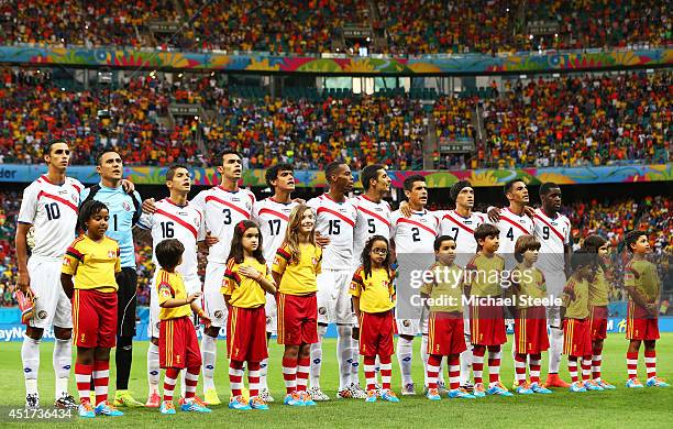 Costa Rica players line up for the National Anthem prior to the 2014 FIFA World Cup Brazil Quarter Final match between the Netherlands and Costa Rica...