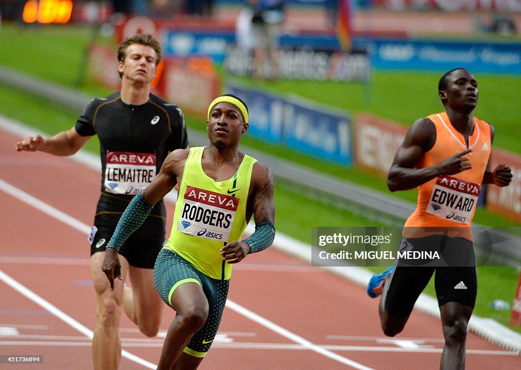 Michael Roreger US sprinter Michael Rodgers wins the 100m event, alongside... News ...