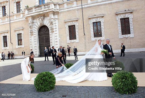Elisabetta Maria Rosboch von Wolkenstein and her father Ettore Rosboch von Wolkenstein arrive for her wedding to Prince Amedeo of Belgium at Basilica...