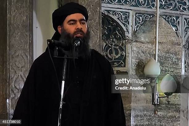 An image grab taken from a video released on July 5, 2014 by Al-Furqan Media shows alleged Islamic State of Iraq and the Levant leader Abu Bakr...