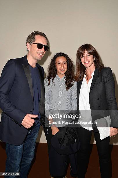 Gad Elmaleh , Albane Cleret and her daughter attend the Paris Eiffel Jumping presented by Gucci at Champ-de-Mars on July 5, 2014 in Paris, France.