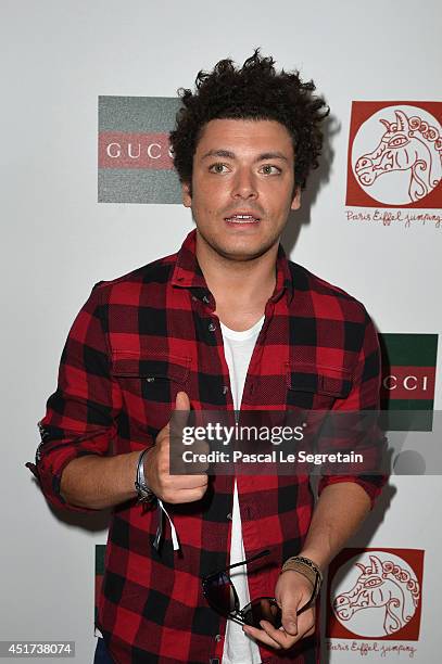 Kev Adams attends the Paris Eiffel Jumping presented by Gucci at Champ-de-Mars on July 5, 2014 in Paris, France.