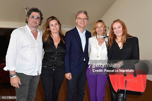 Christophe Bonnat, Coco Couperie Eiffel, Olivier Royant, Virginie Couperie-Eiffel and Patti Scialfa attend the Paris Eiffel Jumping presented by...