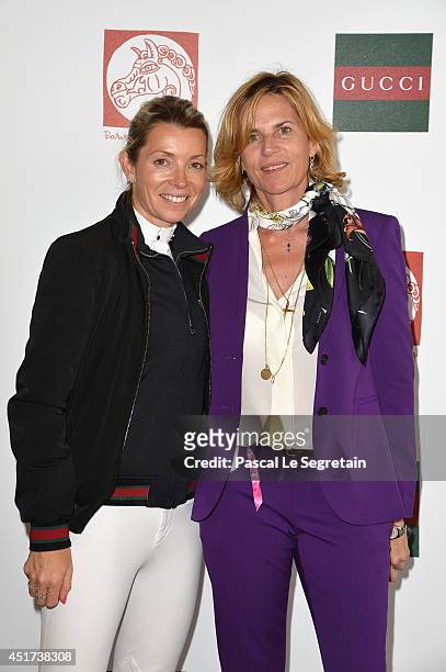 Edwina Tops-Alexander and Virginie Couperie-Eiffel attend the Paris Eiffel Jumping presented by Gucci at Champ-de-Mars on July 5, 2014 in Paris,...