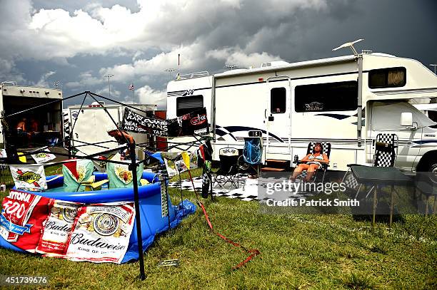 Fans relax in the infield prior to the NASCAR Sprint Cup Series Coke Zero 400 at Daytona International Speedway on July 5, 2014 in Daytona Beach,...