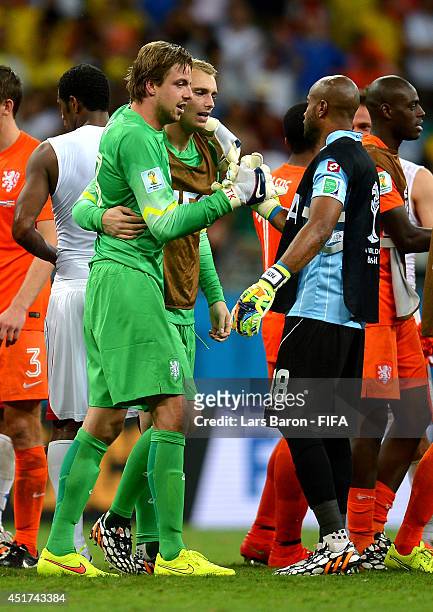 Tim Krul of the Netherlands shakes hands with Patrick Pemberton of Costa Rica after the win in the penalty shootout in the 2014 FIFA World Cup Brazil...