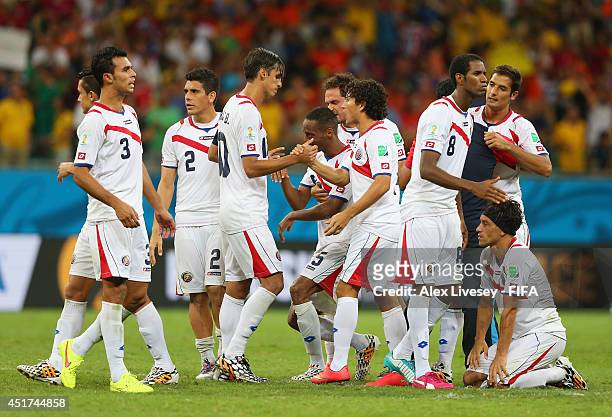 Costa Rica players react after the defeat in the 2014 FIFA World Cup Brazil Quarter Final match between Netherlands and Costa Rica at Arena Fonte...