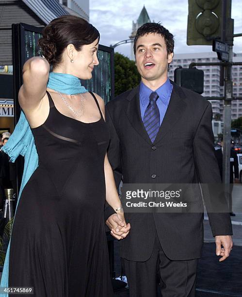 Carrie-Anne Moss and Steven Roy during The Matrix Reloaded Premiere at Mann Village Theater in Westwood, California, United States.