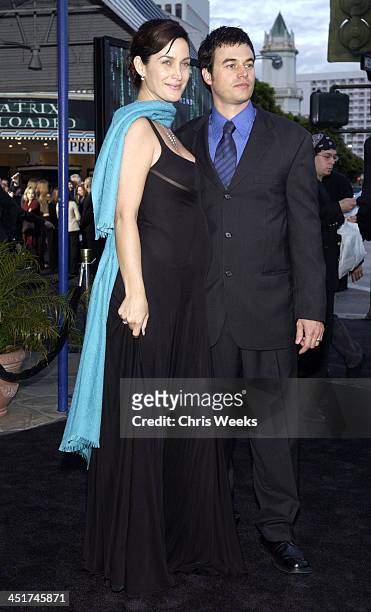 Carrie-Anne Moss and Steven Roy during The Matrix Reloaded Premiere at Mann Village Theater in Westwood, California, United States.