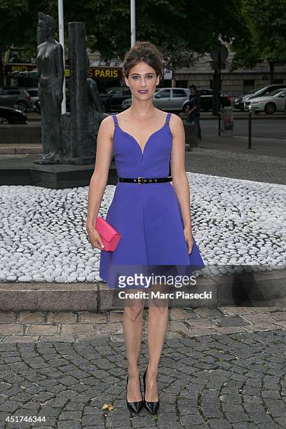 Actress Melanie Bernier arrives to attend the Miu Miu Resort Collection Presentation on July 5, 2014 in Paris, France.